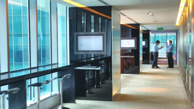 Thomson Reuters Singapore office hallway and monitors