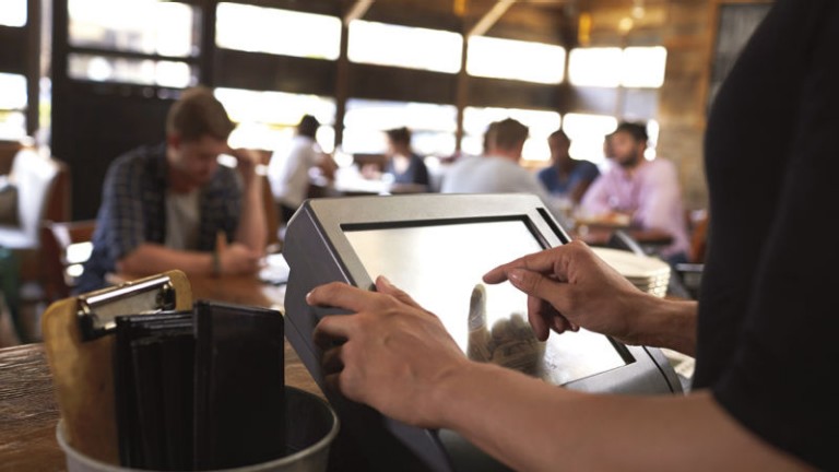 Preparing the bill at a restaurant using a touch screen till