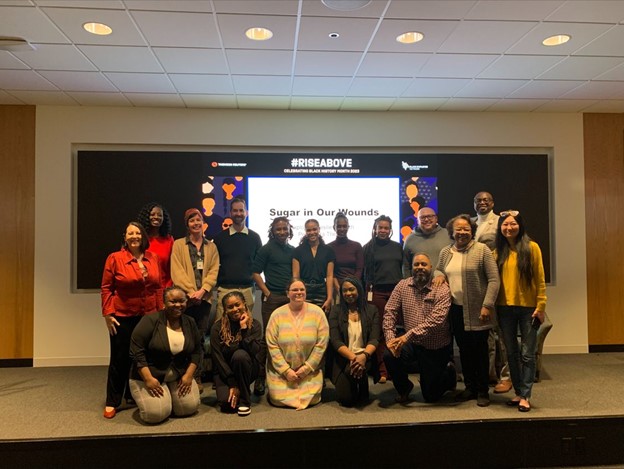 Thomson Reuters teammates posing for a group photo during the ‘Sugar in Our Wounds: Exploring Resilience with Penumbra Theatre.’ session