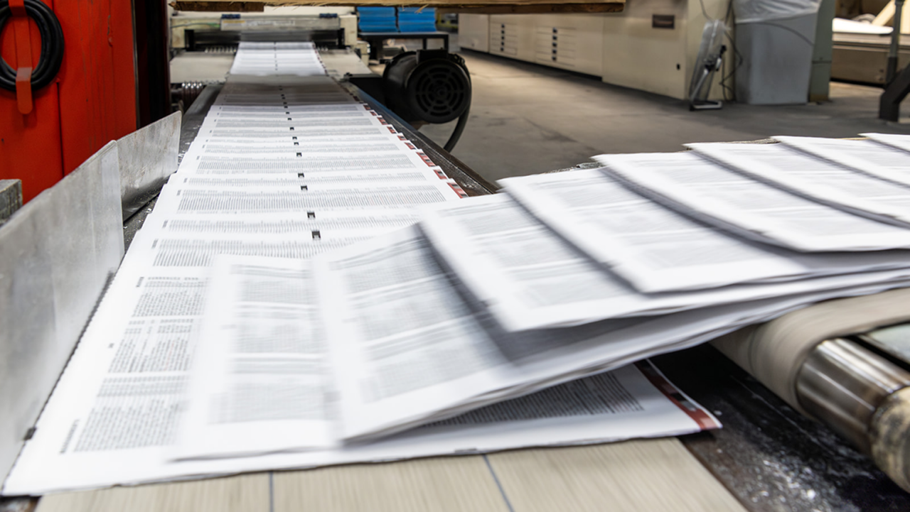 Papers on a printing press