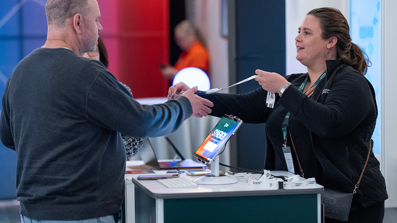 Attendee checking in at Synergy registration
